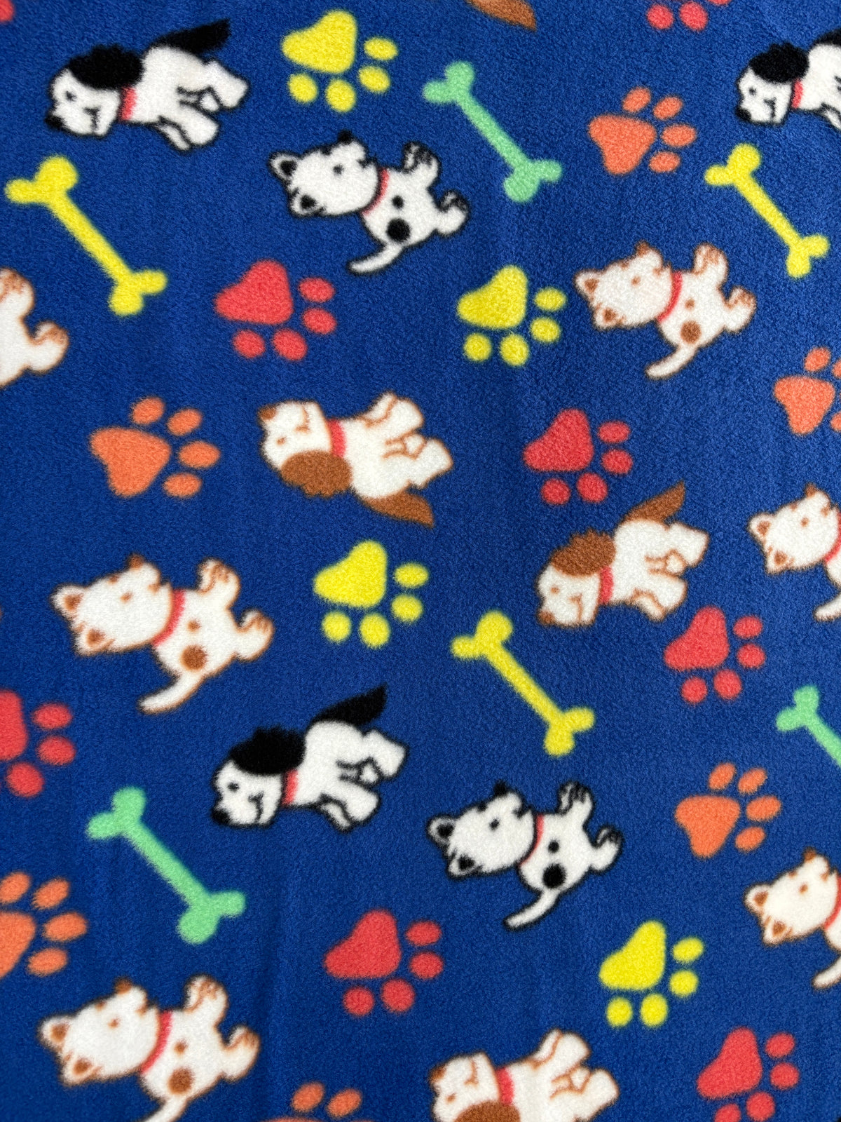 Yukon Bright Puppies and Bones Fleece Fabric